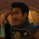 Kingo, in his Ikaris costume, excitedly greets his fellow Eternals on his Bollywood movie set.